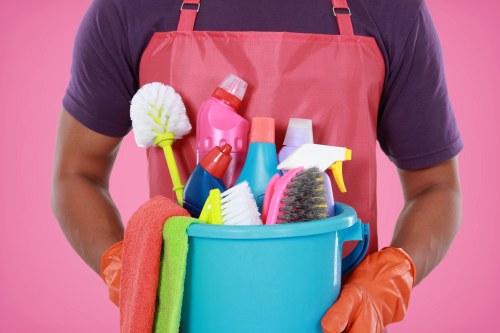 House clearance team working in a SW11 flat with furniture and household items