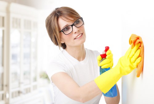 Cleaner working in a modern SW11 apartment building