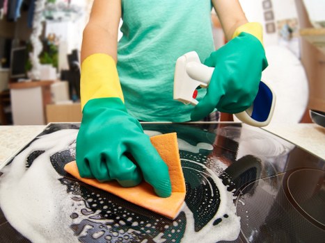 Cleaning team working in a shared corridor of a SW11 block