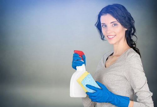 Local oven cleaner working in an SW11 flat kitchen